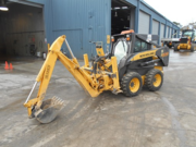 New Holland Skidsteer L170 with backhoe attachment and 4 in 1 bucket